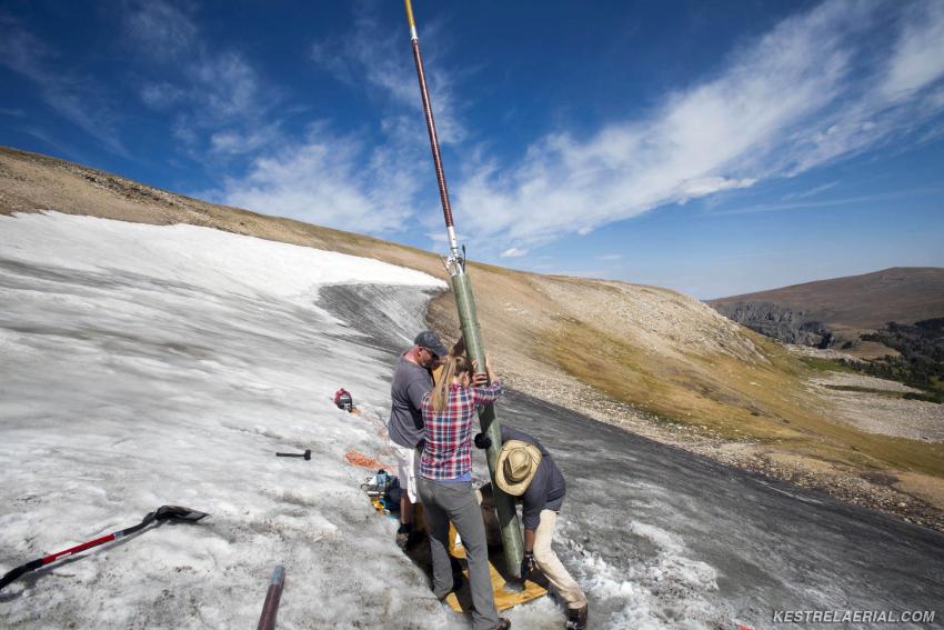 A field team led by Craig Lee (INSTAAR, UC-Boulder) and co-principal investigators David McWethy (Montana State University) and Greg Pederson (US Geological Survey) use the Prairie Dog Drill to recover a core from an ice patch in the Greater Yellowstone Area