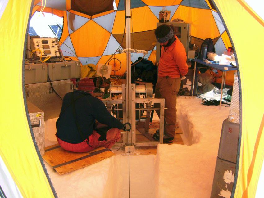 Mike Waszkiewicz (left) and Brad Markle (right) inside the drill tent with the Eclipse Drill during the 2013 field season at Mt. Hunder, Denali National Park, Alaska