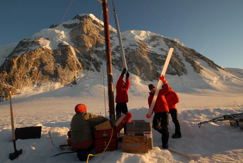 A 2-meter-long section of ice from Combatant Col, Mt. Waddington, British Columbia, is removed from the Thermal Drill