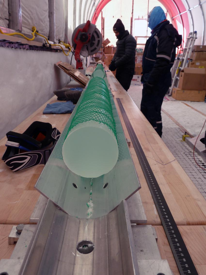 Cutting the 2-meter long sections of brittle ice into 1-meter long sections