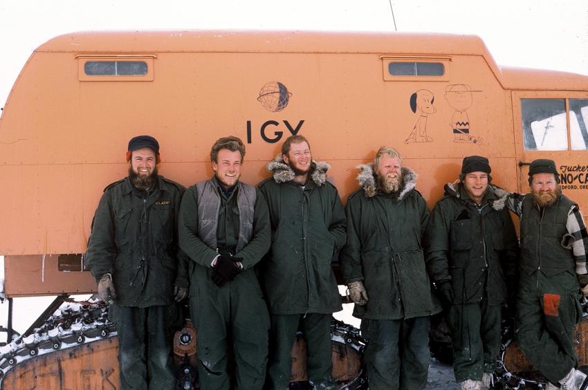 Charles Bentley, far left, and the rest of the Byrd Station traverse team pose in front of a Tucker Sno-Cat in February 1958 after a season of discoveries around West Antarctica