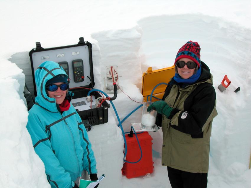 Alden and Mary measuring permeability of surface snow at Summit, Greenland, summer 2011