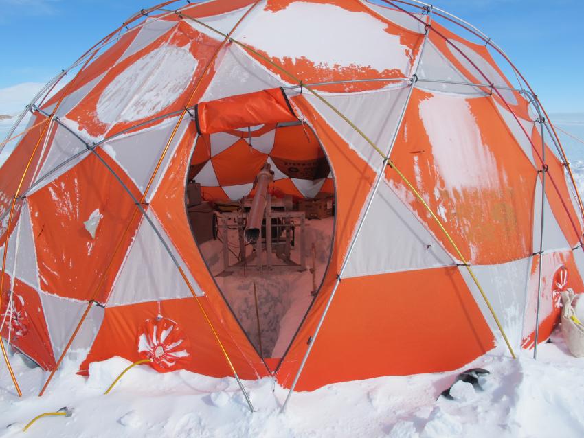 Drilling tent and Eclipse Drill in operation at a snowy Allan Hills, Antarctica