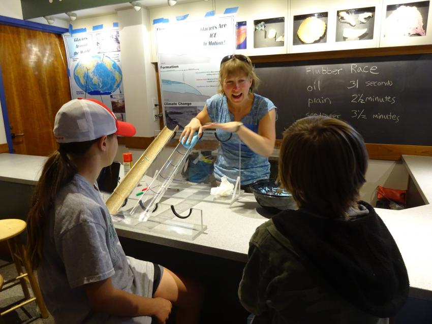Dartmouth post-doc, Dr. Bess Koffman, teaches about glacier flow during the Montshire Museum outreach event