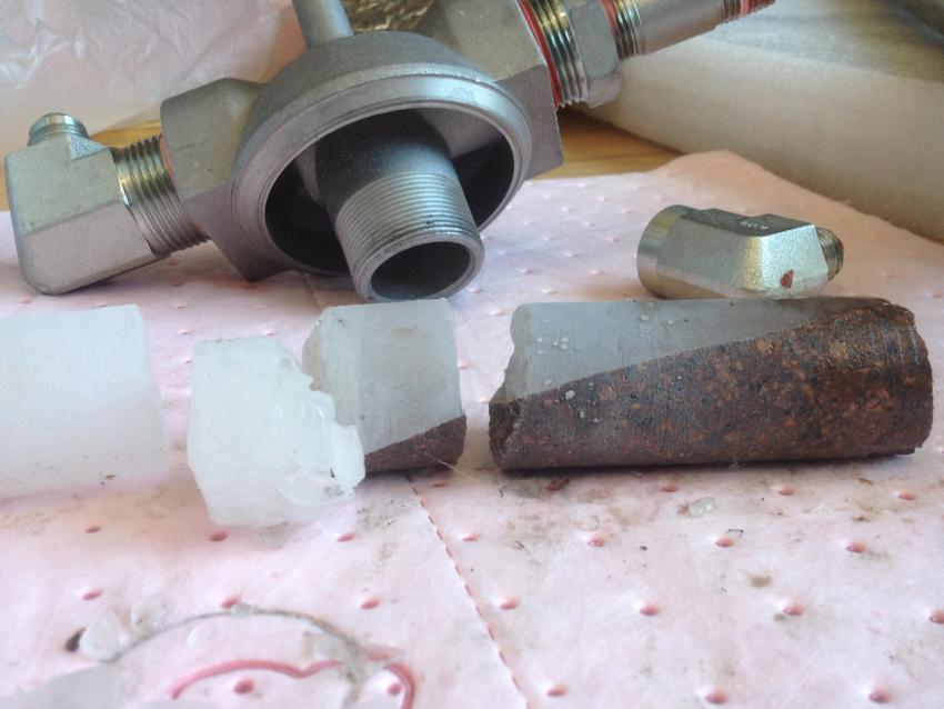 Close-up view of core collected with the Winkie Drill during ice/rock interface testing at the IDDO warehouse