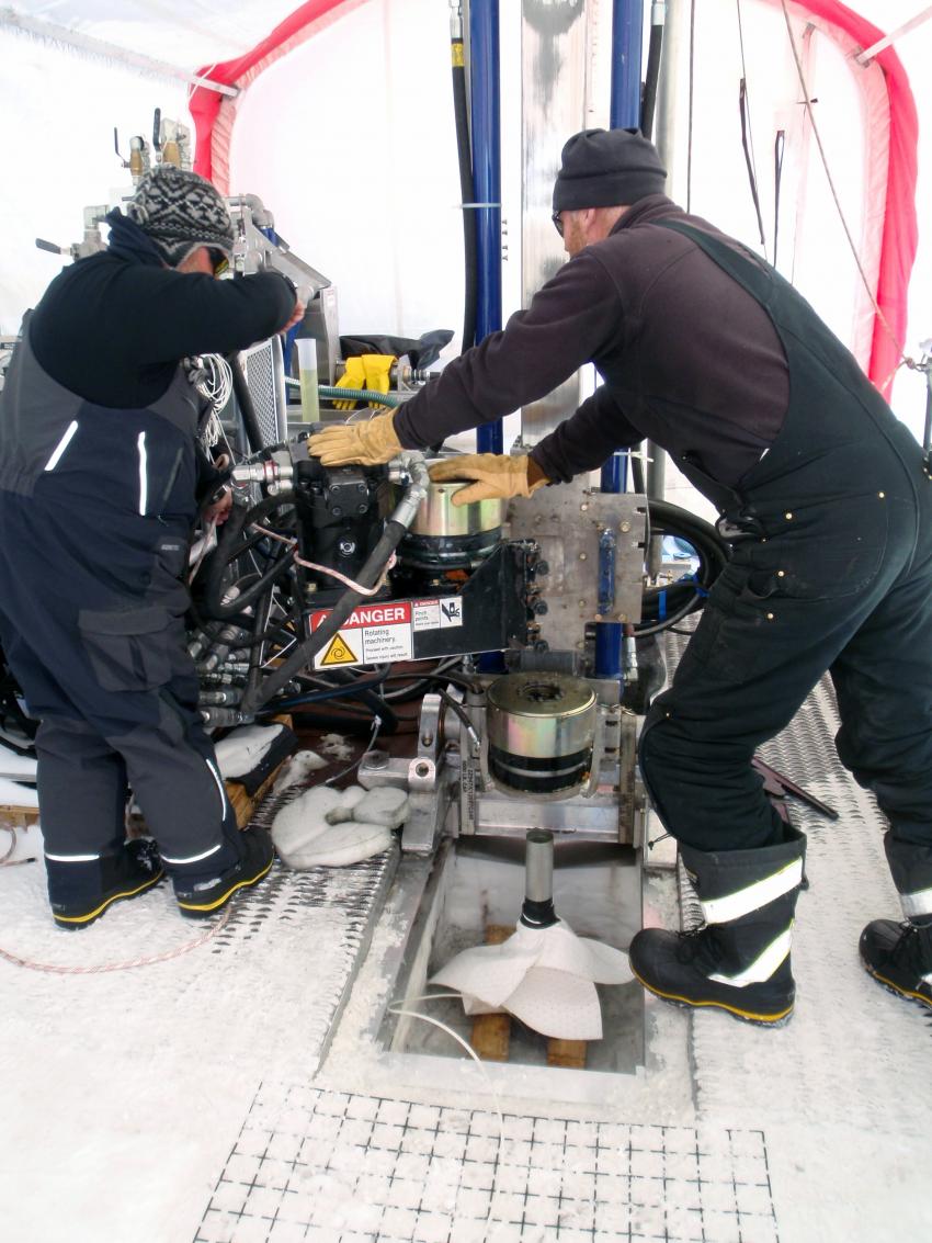 IDP drillers Clayton Armstrong and Mike Jayred operating the ASIG Drill at Pirrit Hills, Antarctica, during the 2016-2017 summer field season