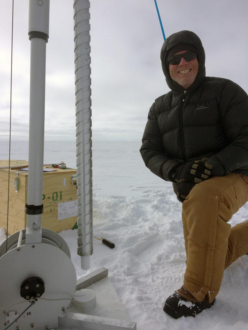 IDDO driller Mike Jayred with the second Stampfli 2-Inch Drill test core drilled during the 2017 Arctic field season