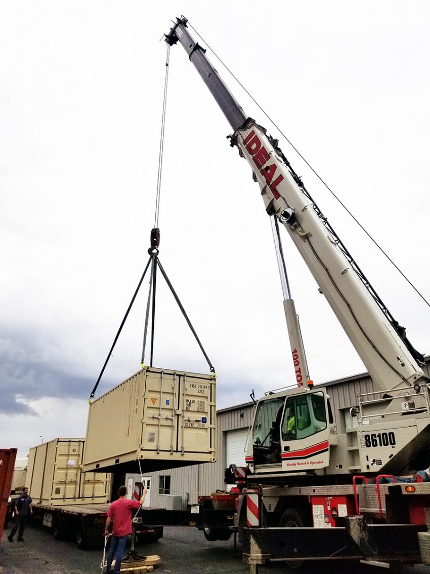A crane loads ASIG Drill containers onto a truck in Madison, WI, for the GreenDrill project. Credit: Krissy Slawny