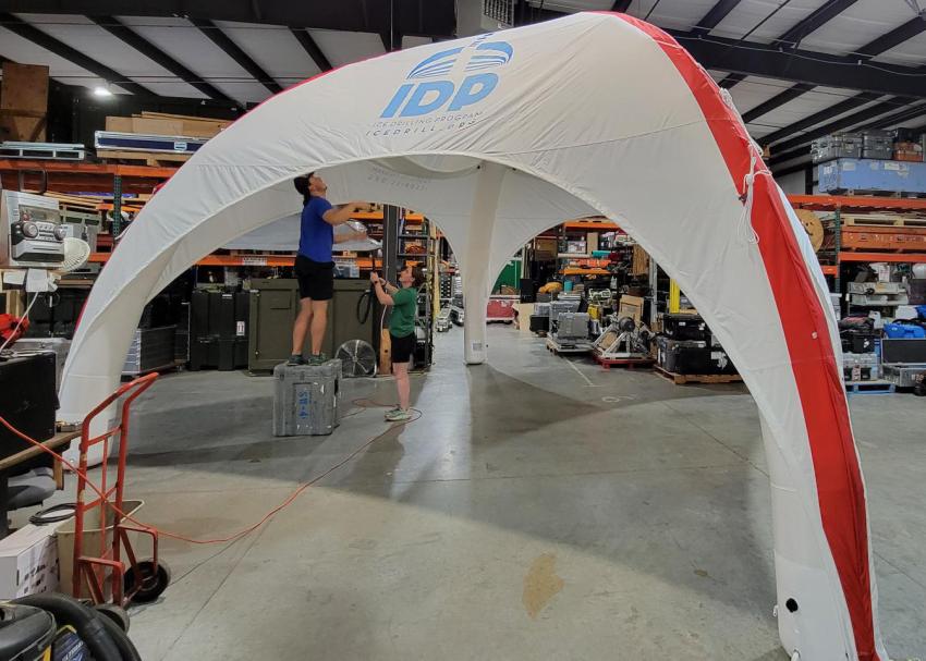 The 6 meter x 6 meter Axion tent set-up inside the IDP-WI warehouse. Photo credit: IDP.