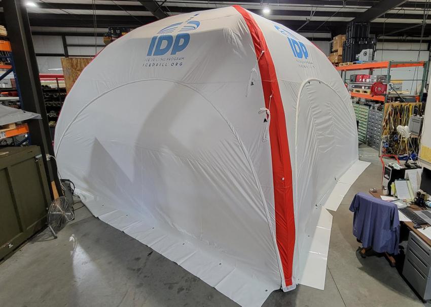 The 6 meter x 6 meter Axion tent set-up inside the IDP-WI warehouse. Photo credit: IDP.